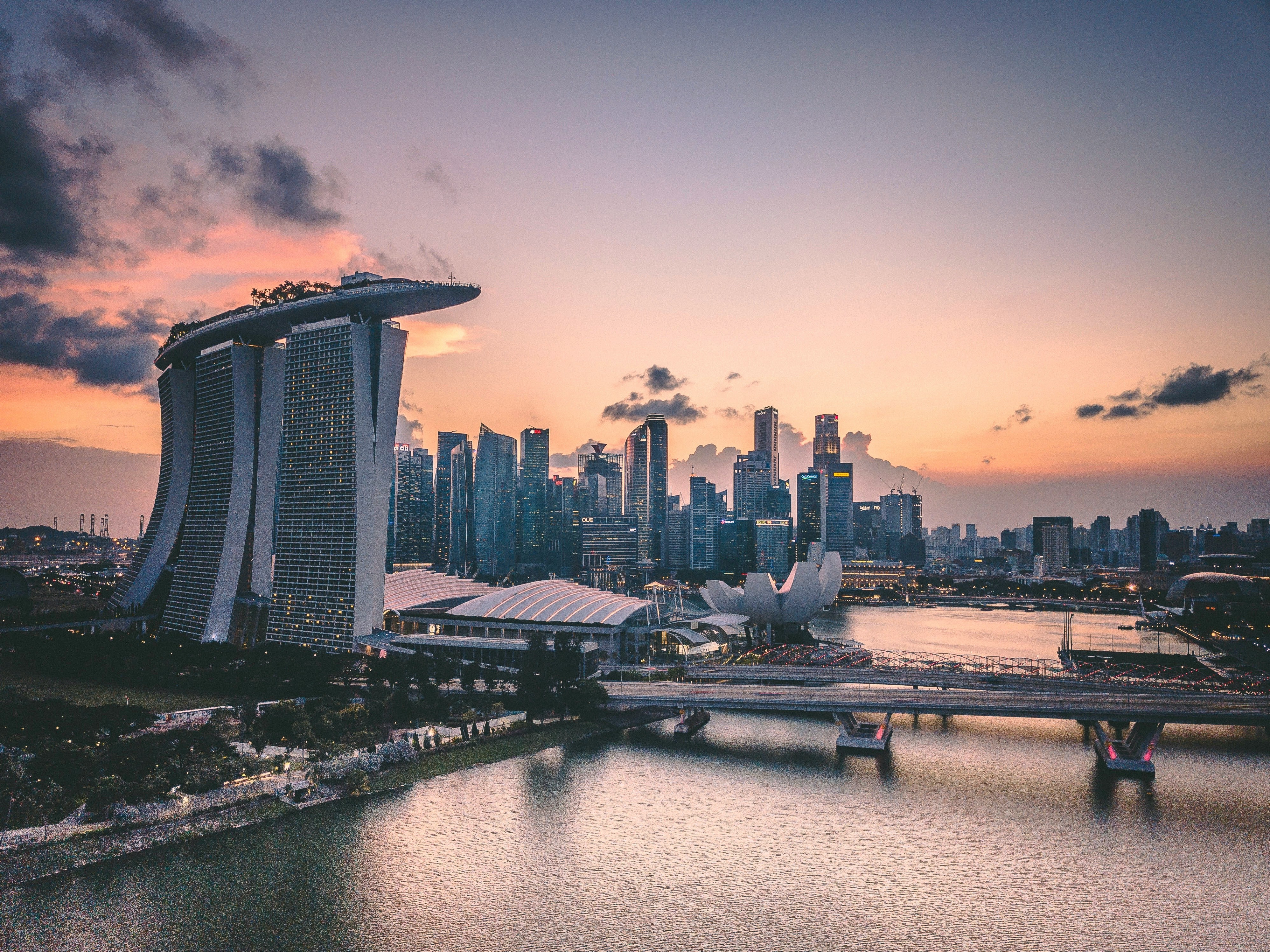 Marina Bay Sands silhouetted against a stunning sunset with the Singapore skyline